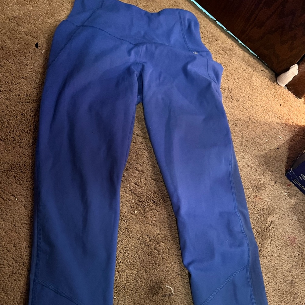 yogalicious blue small leggings. Never worn.
